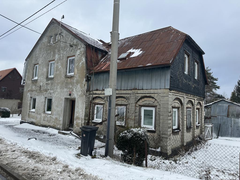 spoluvlastnický podíl k domu v obci Šluknov